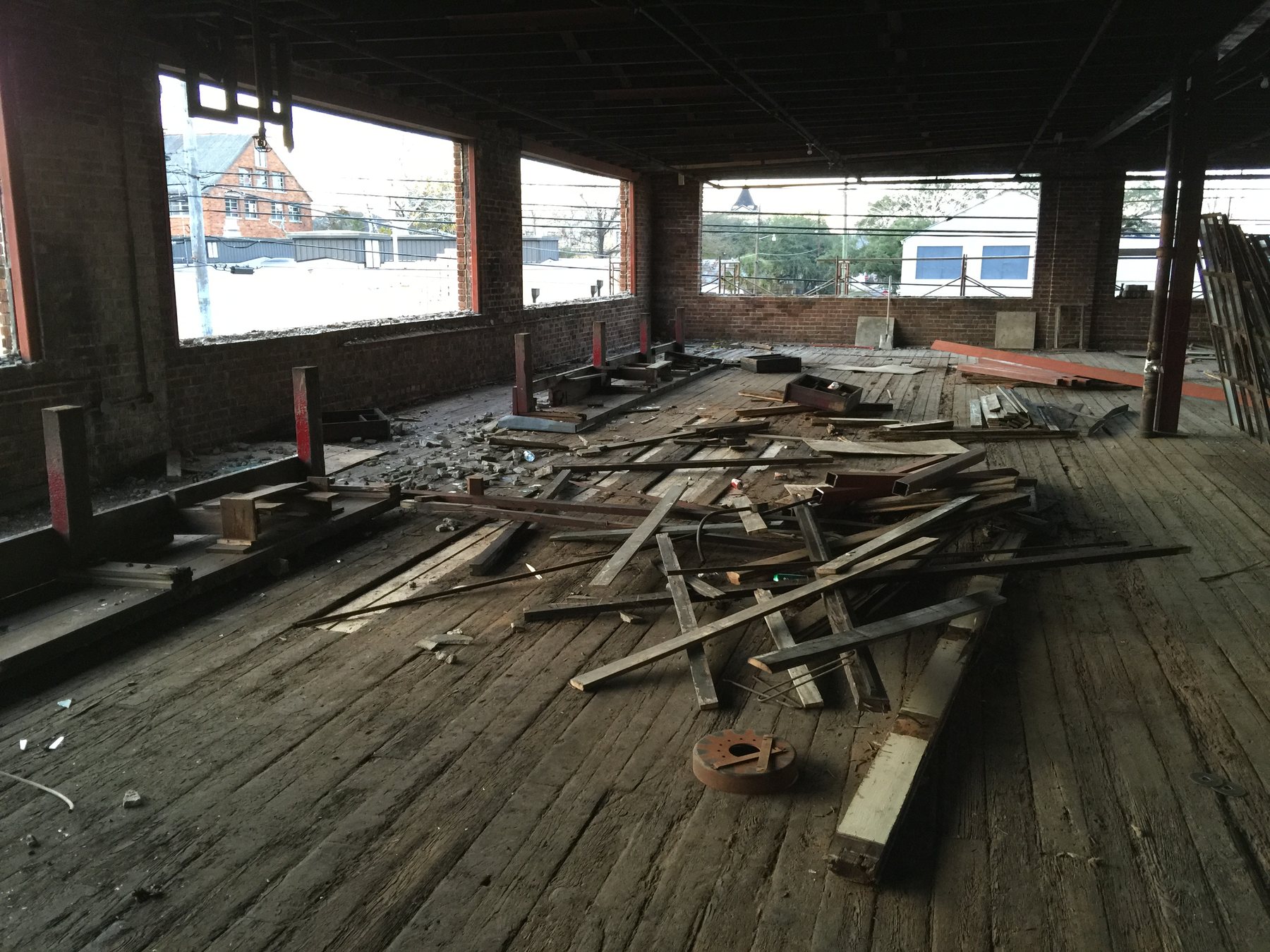 Exposed heavy-timber framing inside the Buick Building during restoration