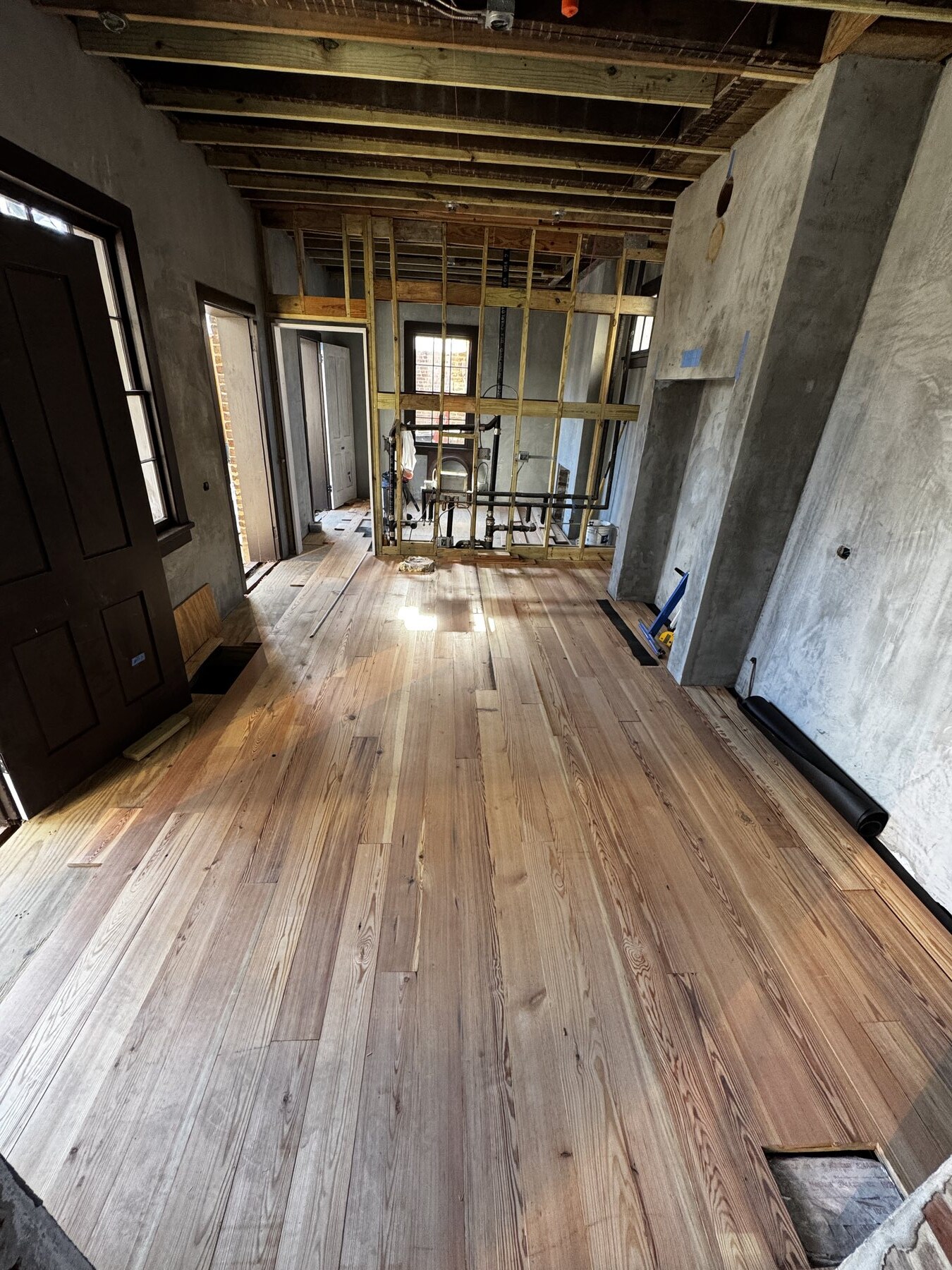 Heart pine floors restored inside the Chighizola House during restoration